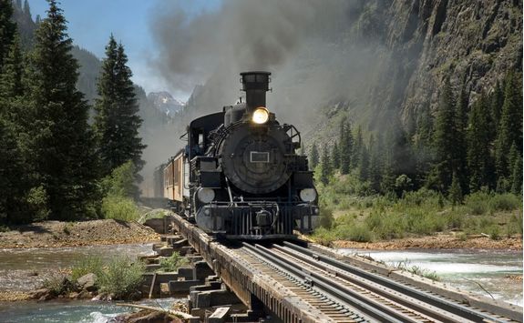 Narrow gauge train river crossing