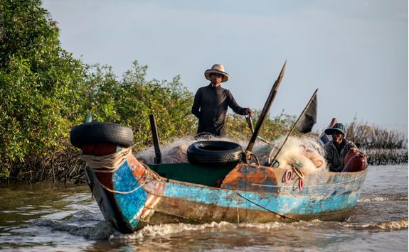 two fishermen on the fishing boat