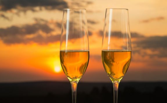two champagne cup and sunset