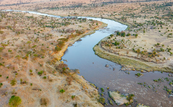 Mara river winding across the Serengeti savanna in Tanzania