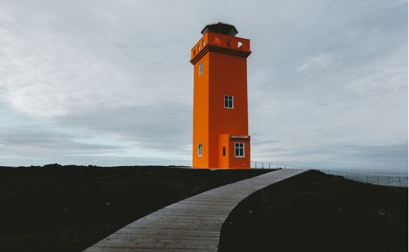 Picturesque remote orange lighthouse