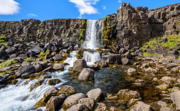 Waterfall nestled around rocks
