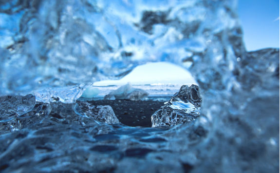 Blue icebergs floating in the lagoon