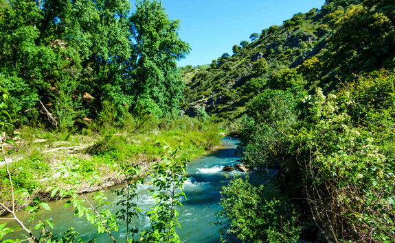 River running through mountains