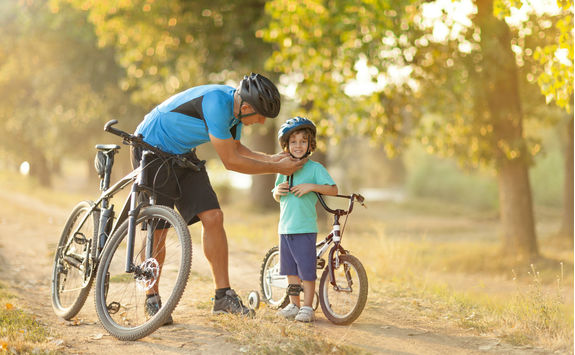 Father and son riding bicycles