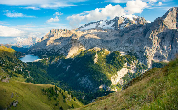 View to Marmolada and Fedaia lake in the Dolomites