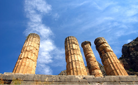 Low view of the remaining columns of a temple in Mycenae