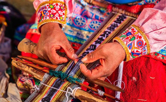 peruvian woman weaving