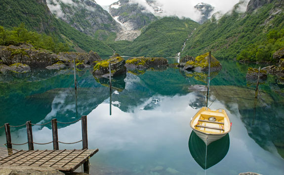Fishing boat on mountain lake Norway