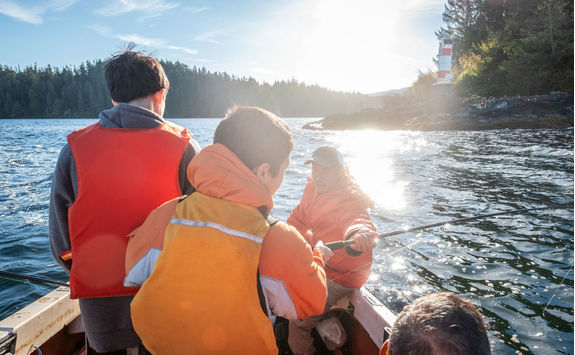 Kids learning to fish in Canada