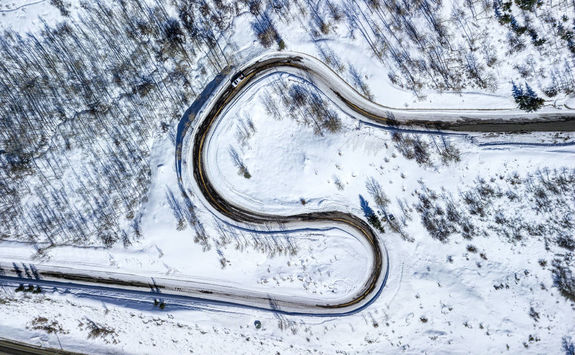 snowy road from above