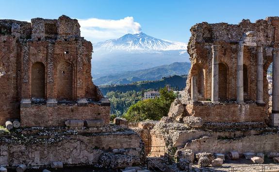 mount etna through ruins