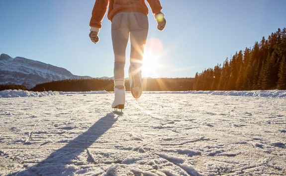 Ice skating on a frozen lake