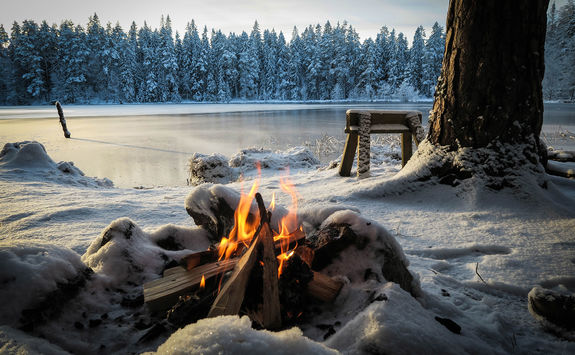 Making a fire outdoors in Swedish Lapland