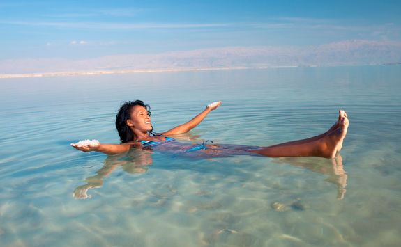 Floating on the Dead Sea, Israel