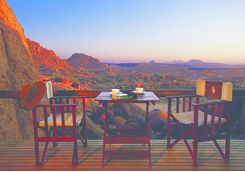 Table and chairs with a view at Mowani