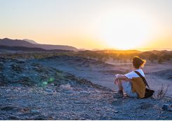 A person admiring the sunset at twyfelfonteim