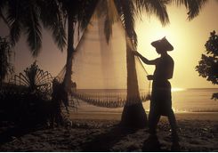 Traditional weaving in Lombok at sunset