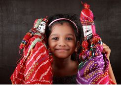Udaipur girl with puppets