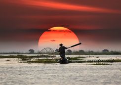 Fisherman at sunset on Inle Lake