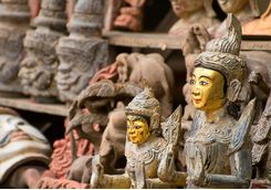 Carved wooden statutes