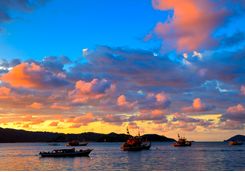 Boats under a Sunset