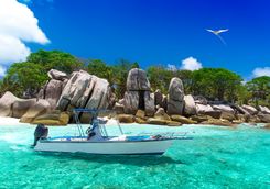 a boat in the tropical ocean