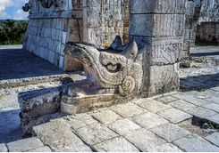 a detailed serpent statue at chichen itza
