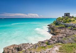 tropical beach with Tulum's ancient ruins