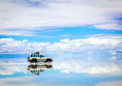 Car driving across the salt flats