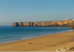 a family on a beach in the Algarve