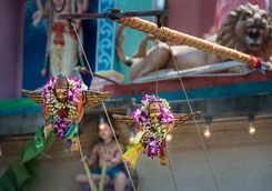 Figurines hanging outside temple