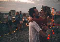 Couple at rooftop bar