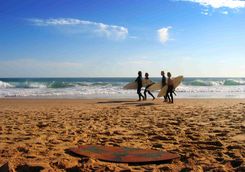 Surfers on a Beach