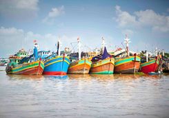 fishing boats on the mekong delta