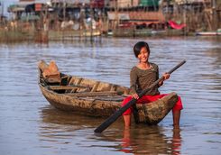 Girl in boat on Tonle Sap lake