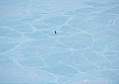 walking across frozen lake