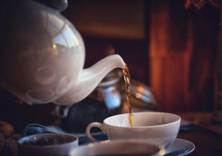Pouring tea into a cup