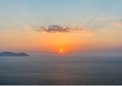 Sun setting at sea
