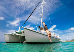 Man diving off a boat