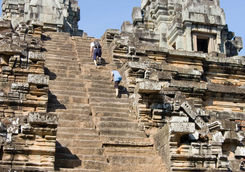 People climbing Ta Keo temple