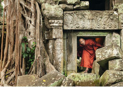 Monk exploring old ruins
