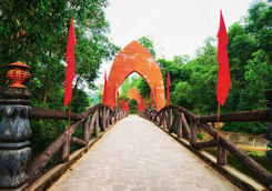 bridge with flags at old hindu temples