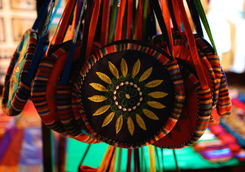 purses at a market in laos