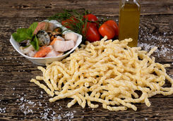 raw busiate with fish dressing