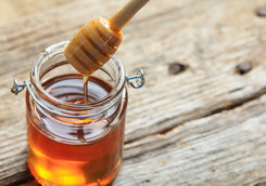 Glass jar with honey