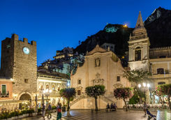Taormina main square with San Giuseppe church and the Clock tower at night