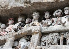 wooden statues of tau tau