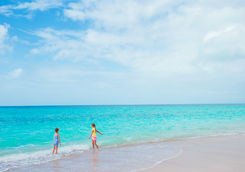 Girls playing on a beach in Antigua