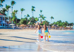 Two girls on a beach in Antigua